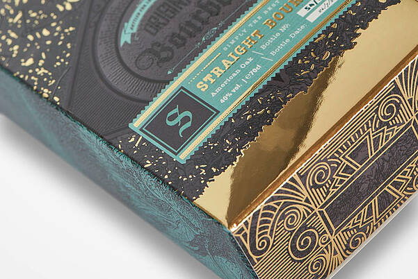 Gold-finished packaging, realized in 3D digital printing with spot varnish